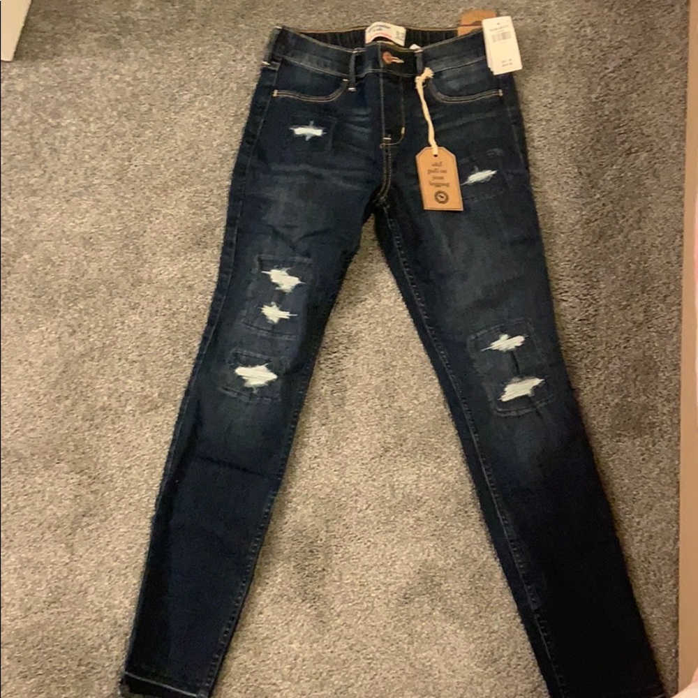 Navy blue ripped jeans